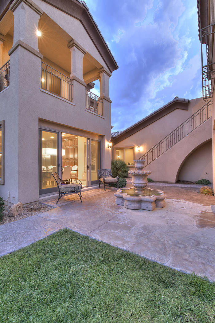 The courtyard is a focal point for social gatherings.  (Synergy/Sotheby’s International Realty)