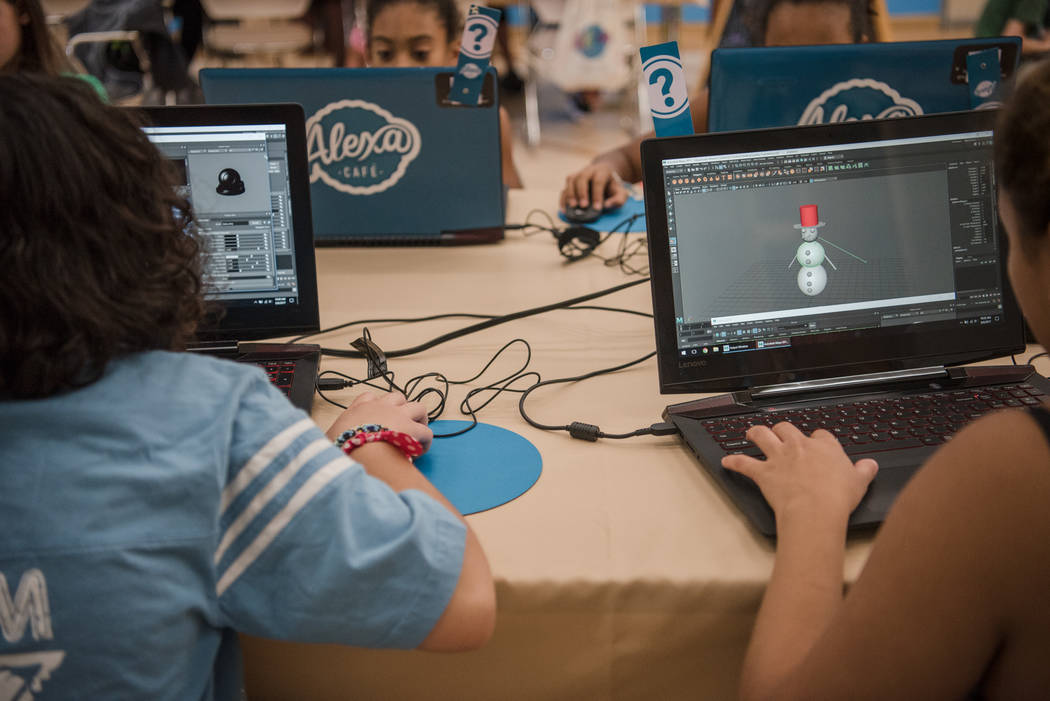 Participants work on 3-D models of snowmen during Alexa Cafe, an all-girls tech camp, at Girl Scouts of Southern Nevada on Tuesday, Aug. 8, 2017, in Las Vegas. (Morgan Lieberman/Las Vegas Review-J ...
