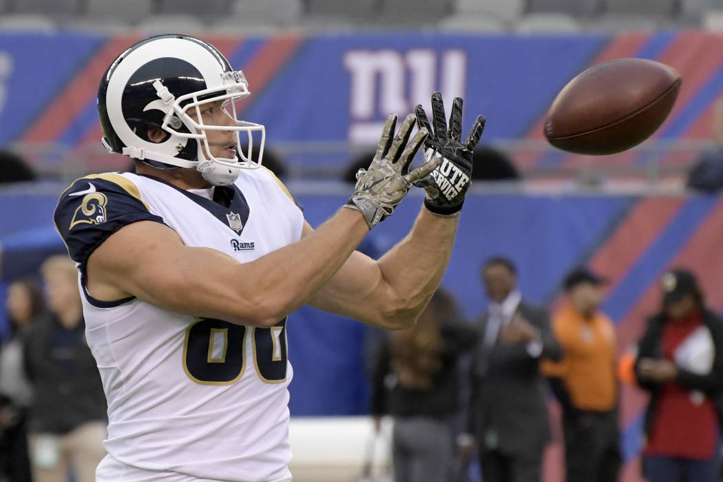 Los Angeles Rams tight end Derek Carrier warms up before an NFL football game against the New York Giants Sunday, Nov. 5, 2017, in East Rutherford, N.J. (AP Photo/Bill Kostroun)