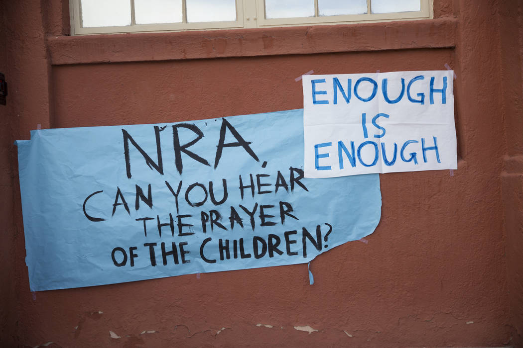 Signs outside of Las Vegas Academy following a student walkout to protest gun violence, in Las Vegas, Wednesday, March 14, 2018. Erik Verduzco Las Vegas Review-Journal @Erik_Verduzco