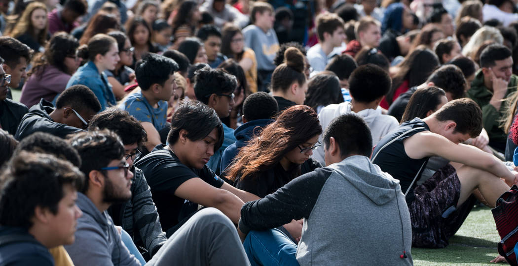 Students at Clark High School in Las Vegas have moments of silence for the victims in the Parkland shooting during the national student walkout, March 14, 2018. (Marcus Villagran)