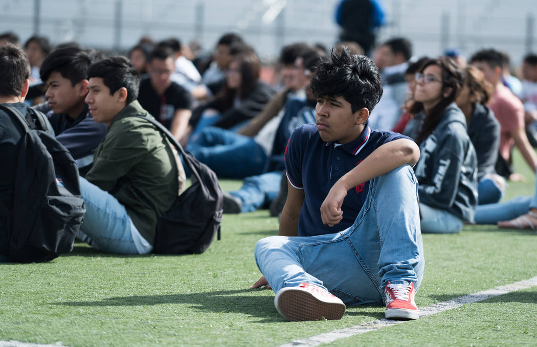 Students at Clark High School in Las Vegas have moments of silence for the victims in the Parkland shooting during the national student walkout, March 14, 2018. (Marcus Villagran)