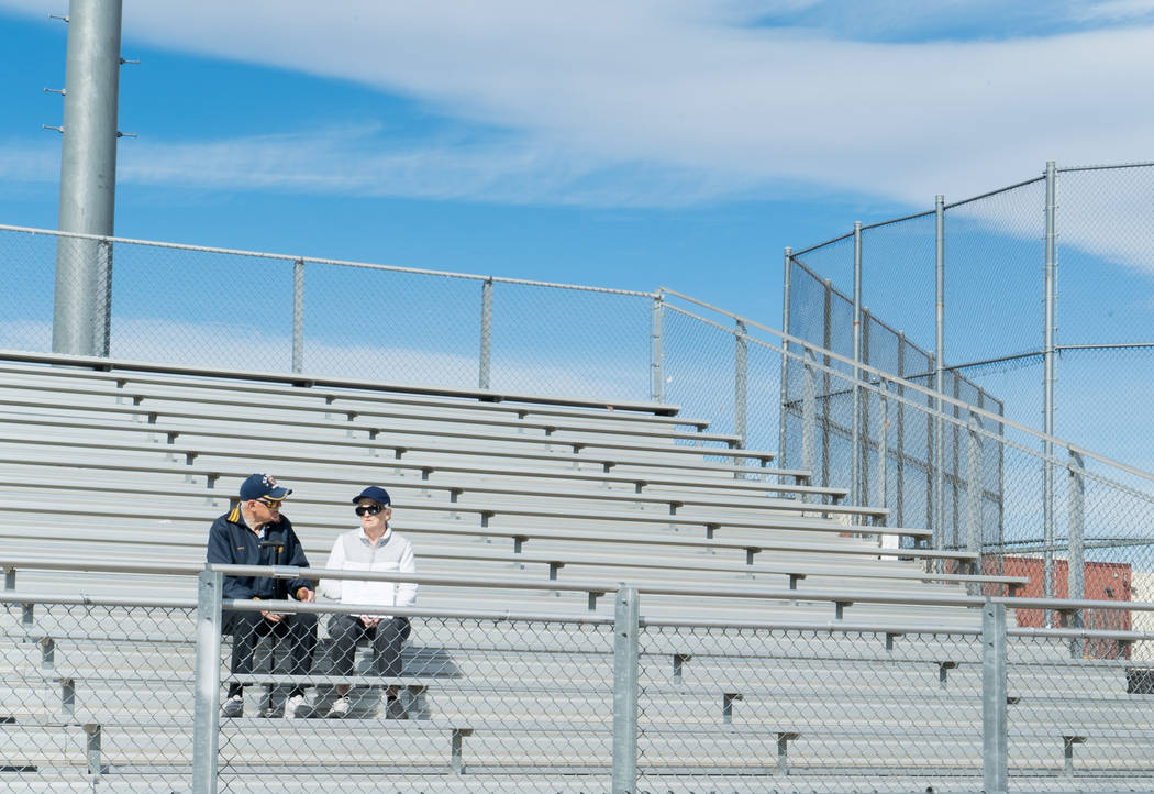 Crossing guards Cliff Leonard and Kay Leonard show their support for students at Clark High School in Las Vegas participating in the national student walkout, March 14, 2018. (Marcus Villagran)