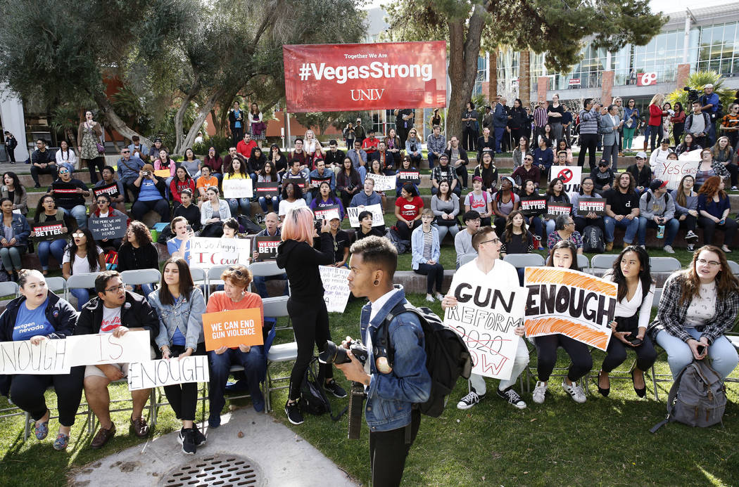 UNLV students gather after marching at their campus in Las Vegas on Wednesday, March 14, 2018 as part of a nationwide protest against gun violence. Bizuayehu Tesfaye/Las Vegas Review-Journal @bizu ...