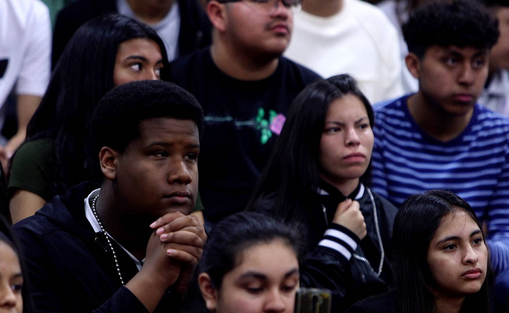 Students listen during an assembly at Valley High School in Las Vegas, Wednesday, March 14, 2018. Students organized an assembly to talk about gun control in response to the Parkland shooting. Rac ...