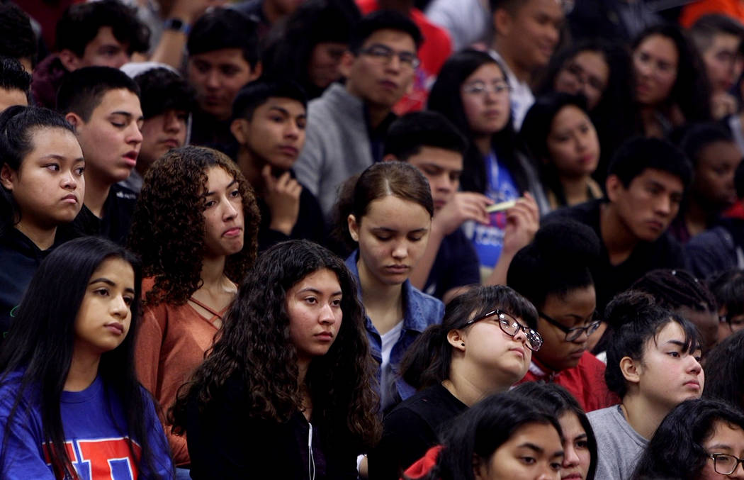 Students listen during an assembly at Valley High School in Las Vegas, Wednesday, March 14, 2018. Students organized an assembly to talk about gun control in response to the Parkland shooting. Rac ...