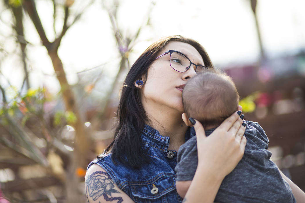 Oct. 1 shooting survivor Miriam Lujan with her son Xander Finch, who was born in the weeks following the Route 91 festival, while visiting the Community Healing Garden in downtown Las Vegas on Fri ...