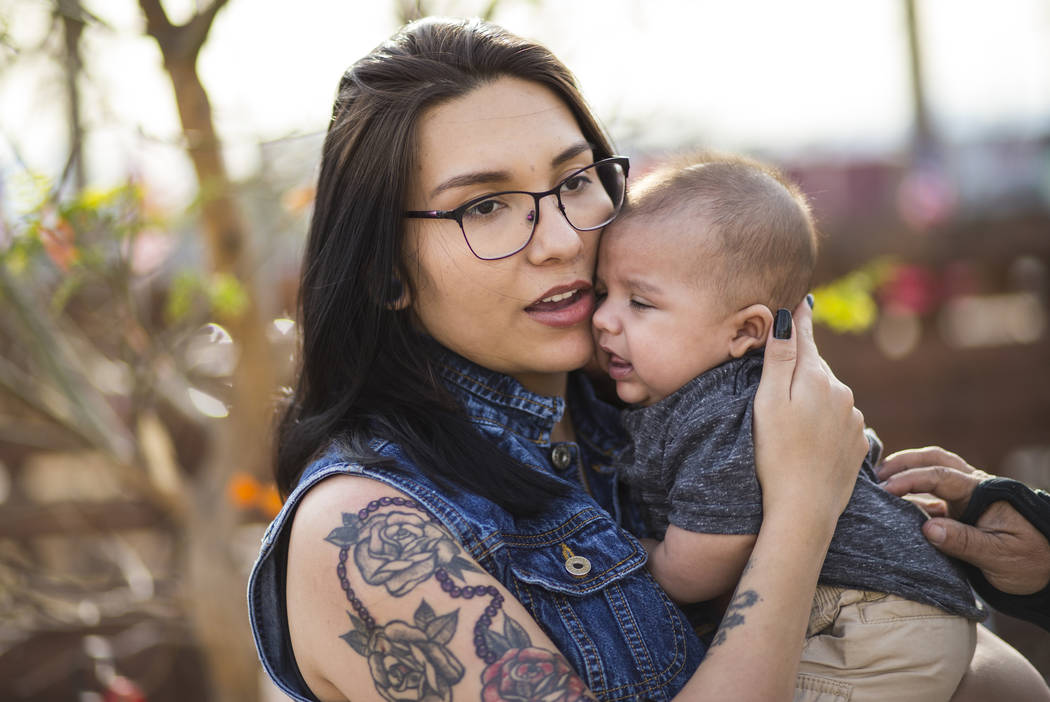 Oct. 1 shooting survivor Miriam Lujan with her son Xander Finch, who was born in the weeks following the Route 91 festival, while visiting the Community Healing Garden in downtown Las Vegas on Fri ...