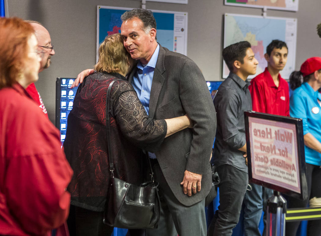 Danny Tarkanian hugs a supporter before filiing for his candidacy for the 3rd Congressional District of Nevada at the Clark County Government Center in Las Vegas on Friday, March 16, 2018, after d ...