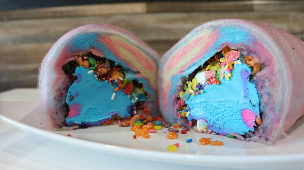 Creamberry’s cotton candy burrito is your choice of ice cream flavor and toppings wrapped in ...