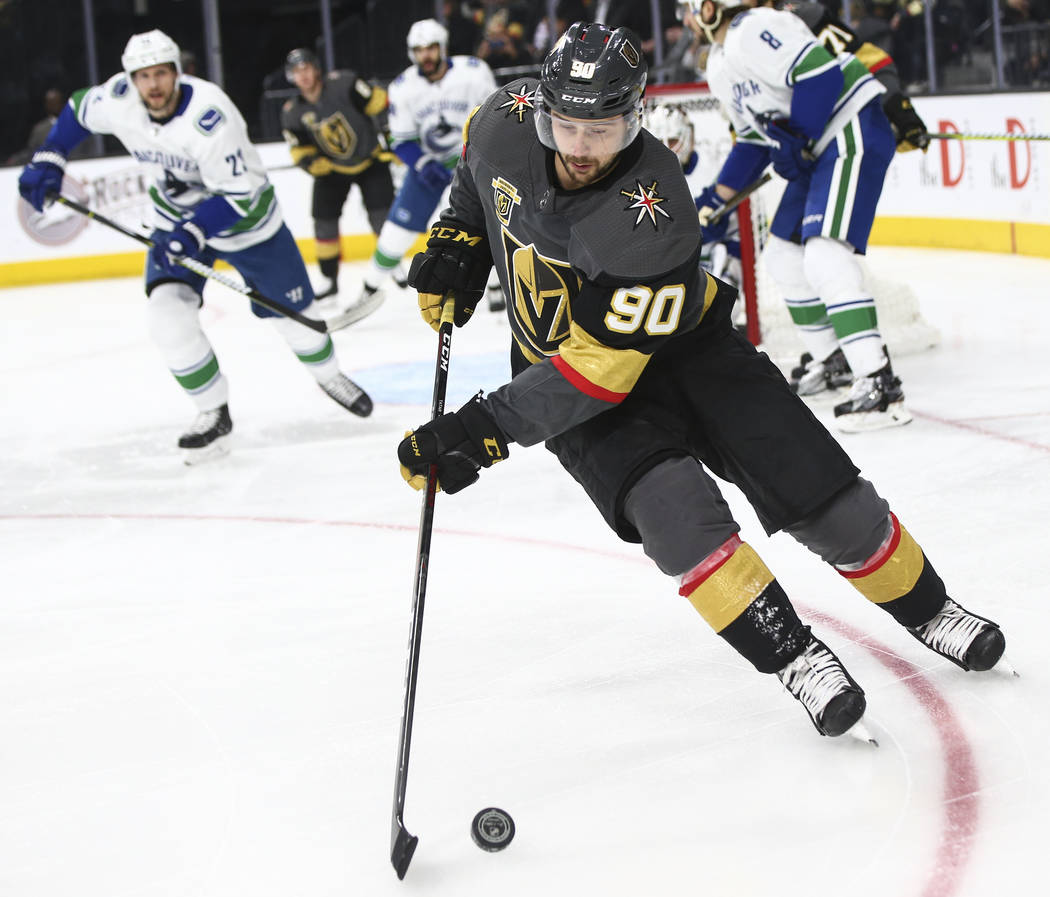 Golden Knights left wing Tomas Tatar (90) skates with the puck during the first period of an NHL hockey game against the Vancouver Canucks at T-Mobile Arena in Las Vegas on Tuesday, March 20, 2018 ...