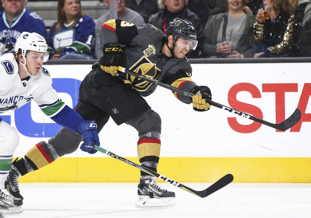 Golden Knights defenseman Brayden McNabb (3) passes the puck during the first period of an NHL hockey game against the Vancouver Canucks at T-Mobile Arena in Las Vegas on Tuesday, March 20, 2018.  ...