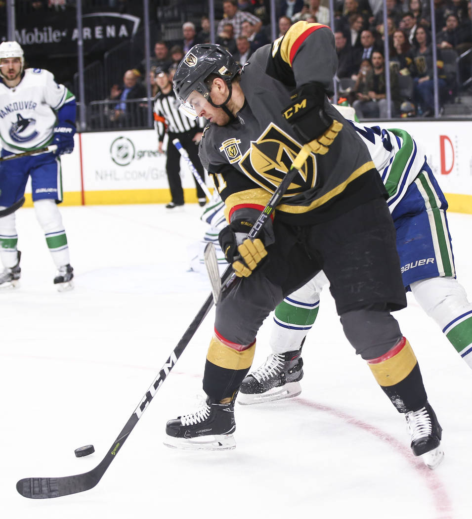 Golden Knights center Jonathan Marchessault (81) controls the puck against the Vancouver Canucks during the third period of an NHL hockey game at T-Mobile Arena in Las Vegas on Tuesday, March 20,  ...