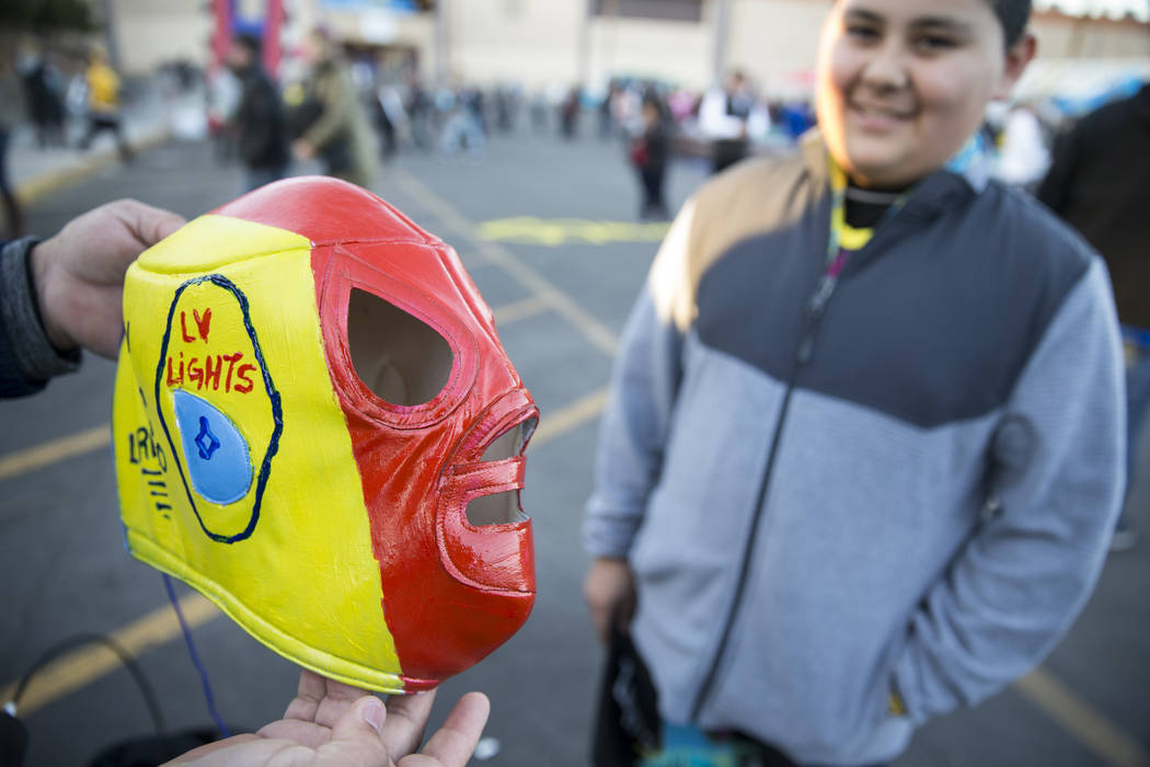 Lorenzo De La Cruz, 13, with his homemade mask during the United Soccer League season home opener game for the Las Vegas Lights FC at Cashman Field in Las Vegas, Saturday, March 24, 2018. Erik Ver ...