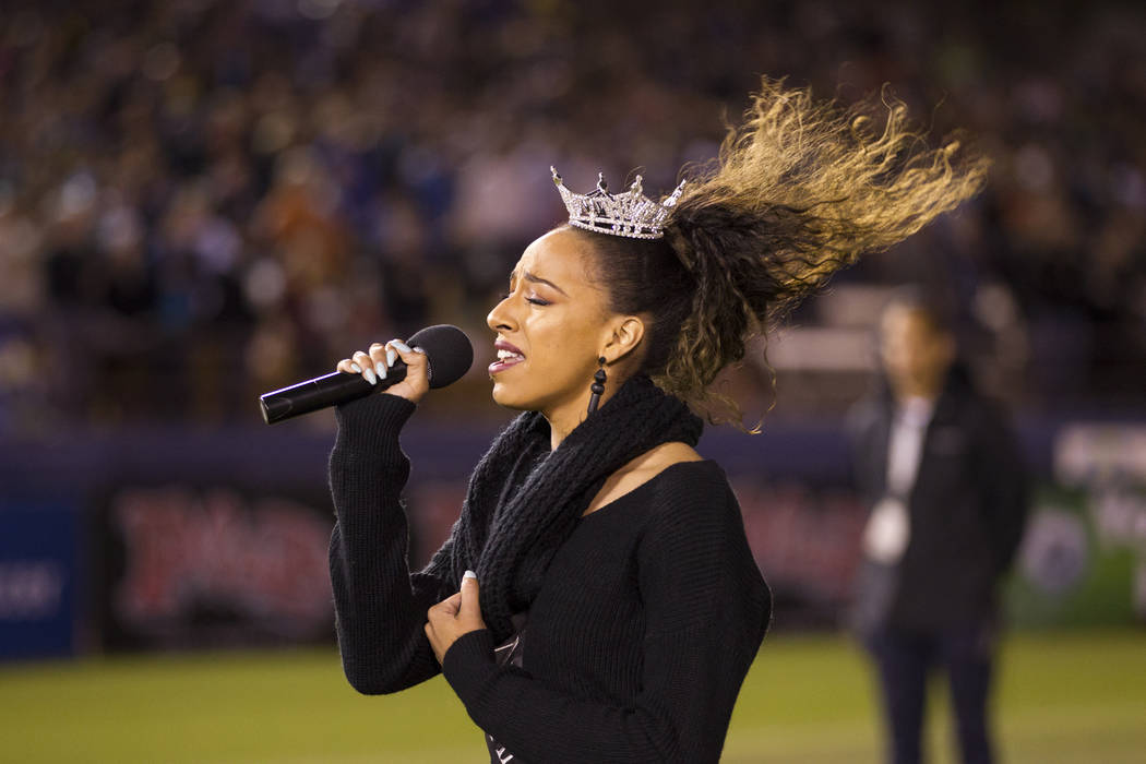 Miss Nevada Andrea Martinez signs the national anthem during the United Soccer League season home opener for the Las Vegas Lights FC against Reno 1868 FC at Cashman Field in Las Vegas, Saturday, M ...