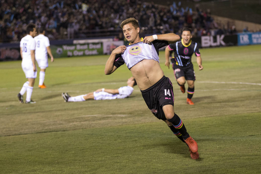 Las Vegas Lights FC’s Alex Mendoza (14) celebrates his goal against Reno 1868 FC in the first half of the United Soccer League game at Cashman Field in Las Vegas, Saturday, March 24, 2018.  ...