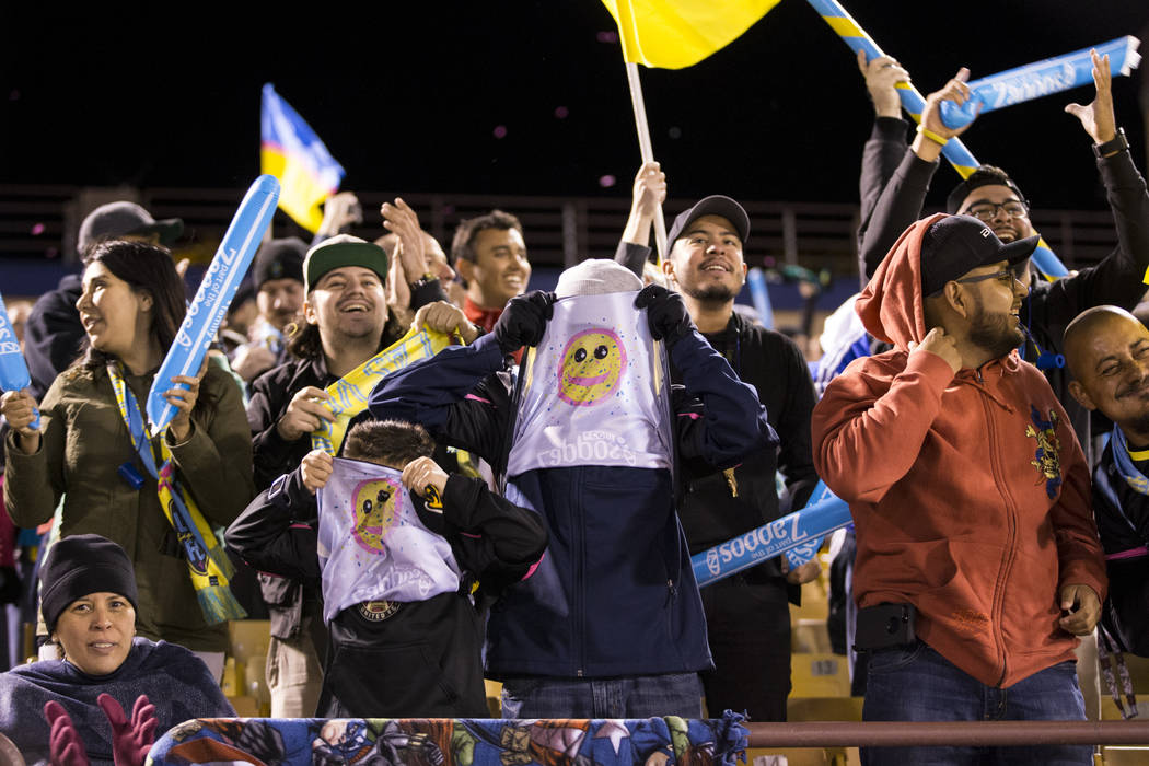 Fans celebrate a goal by the Las Vegas Lights FC against Reno 1868 FC during the first half of the United Soccer League game at Cashman Field in Las Vegas, Saturday, March 24, 2018. Erik Verduzco  ...