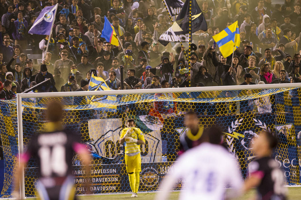 Las Vegas Lights FC fans cheer for their team against Reno 1868 FC during the second half of the United Soccer League game at Cashman Field in Las Vegas, Saturday, March 24, 2018. The game ended i ...