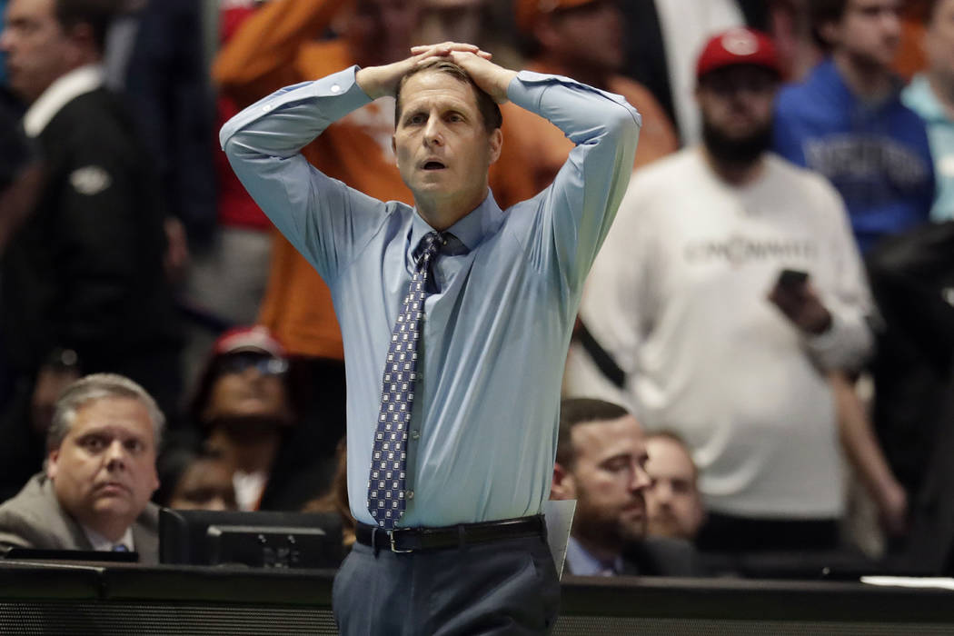 Nevada head coach Eric Musselman watches from the bench in the second half of a first-round game against Texas in the NCAA college basketball tournament in Nashville, Tenn., Friday, March 16, 2018 ...