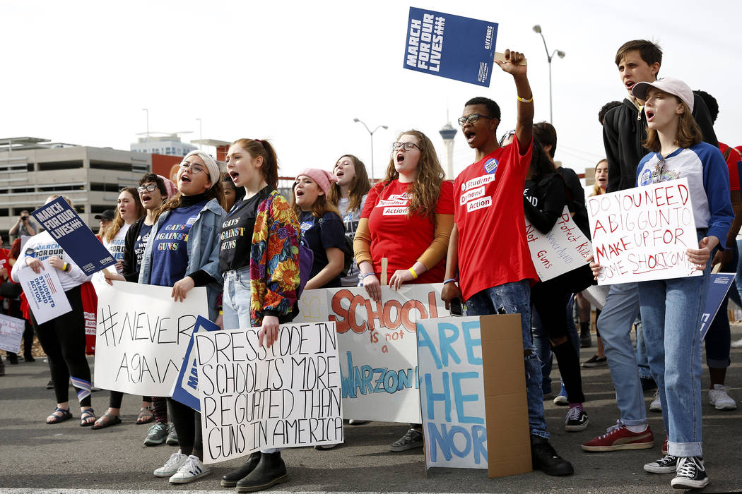 Attendees practice chants before the start of the Las Vegas March for Our Lives event at Symphony Park in Las Vegas on Saturday, March 24, 2018. Andrea Cornejo Las Vegas Review-Journal @dreacornejo
