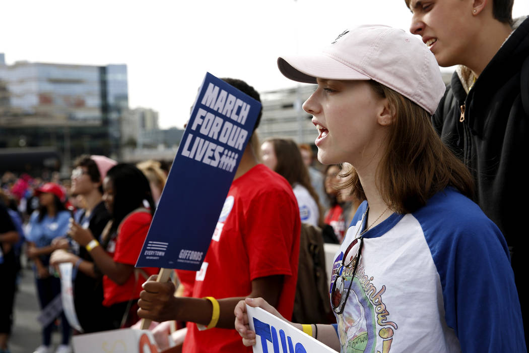 Summer Wilde, a 16-year-old student from Silverado High School, practices chants before the start of the Las Vegas March for Our Lives event at Symphony Park in Las Vegas on Saturday, March 24, 20 ...