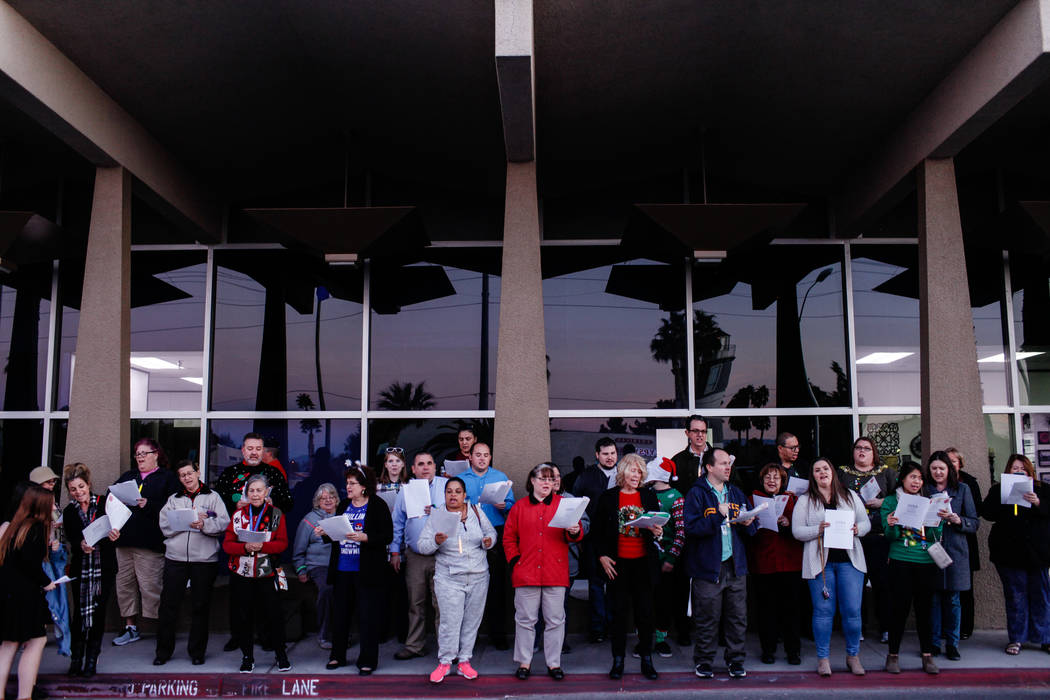 Clark County Education Association teachers protest outside the Edward A. Greer Education Center before a Clark County School District Board of Trustees meeting in Las Vegas, Tuesday, Dec. 5, 2017 ...