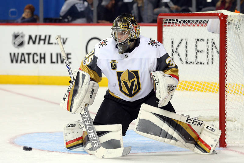 Oct 30, 2017; Brooklyn, NY, USA; Vegas Golden Knights goalie Oscar Dansk (35) makes a save against the New York Islanders during the second period at Barclays Center. Mandatory Credit: Brad Penner ...