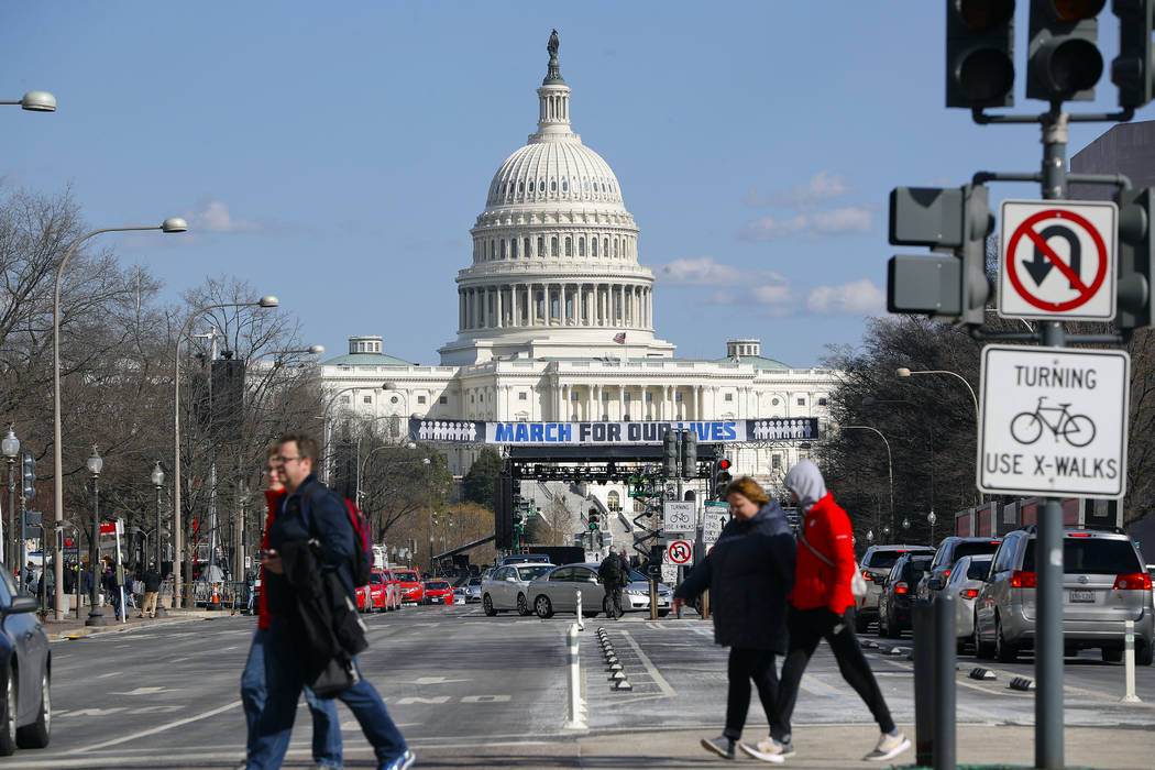 The stage area is set up on Pennsylvania Avenue near the U.S. Capitol in Washington, Friday, March 23, 2018, a day before the "March for Our Lives" rally in support of gun control. (AP P ...