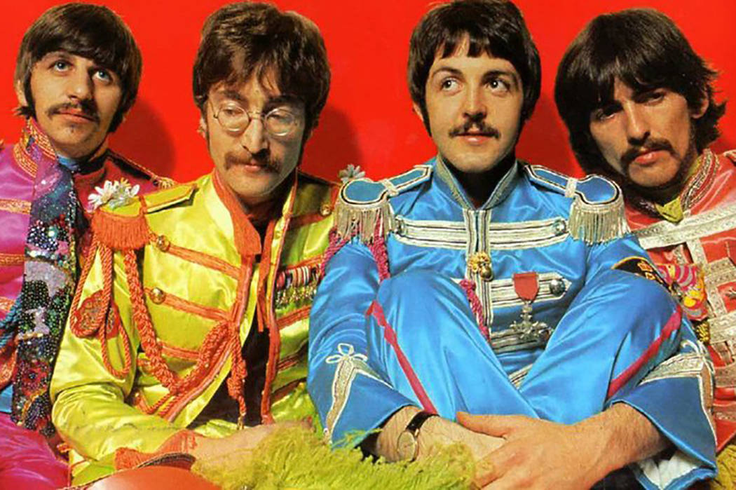 The centerfold of the 1967 Beatles album "Sgt. Pepper's Lonely Hearts Club Band" features the Fab Four in costume as an Edwardian-era military band. Ringo Starr, left. John Lennon, Paul McCartney  ...