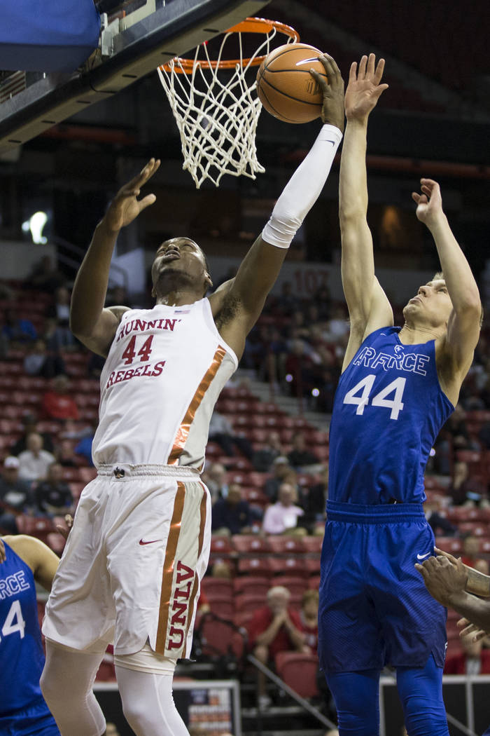 UNLV Rebels forward Brandon McCoy (44) shoots for a score against pressure from Air Force Falcons guard Keaton Van Soelen (44) in the first half of the Mountain West Conference men's basketball&#x ...