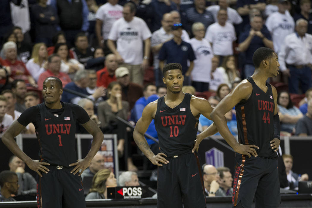 UNLV Rebels guard Kris Clyburn (1), forward Shakur Juiston (10) and forward Brandon McCoy (44) wait for play to resume in the second half of the Mountain West Conference men's basketball tournamen ...