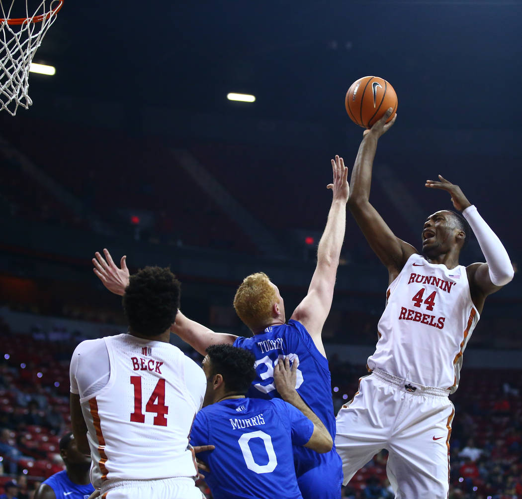 UNLV Rebels forward Brandon McCoy (44) shoots over Air Force Falcons center Frank Toohey (33) and guard Caleb Morris (0) during a basketball game at the Thomas & Mack Arena in Las Vegas on Wed ...