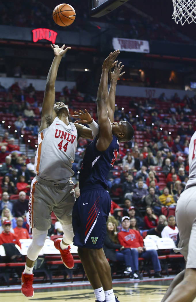 UNLV Rebels forward Brandon McCoy (44) shoots over Fresno State Bulldogs forward Bryson Williams (11) during the first half of a basketball game at the Thomas & Mack Center in Las Vegas on Wed ...
