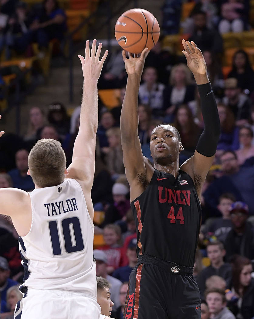 UNLV forward Brandon McCoy (44) shoots over Utah State forward Quinn Taylor (10) during an NCAA college basketball game Saturday, March 3, 2018, in Logan, Utah. (Eli Lucero/The Herald Journal via AP)