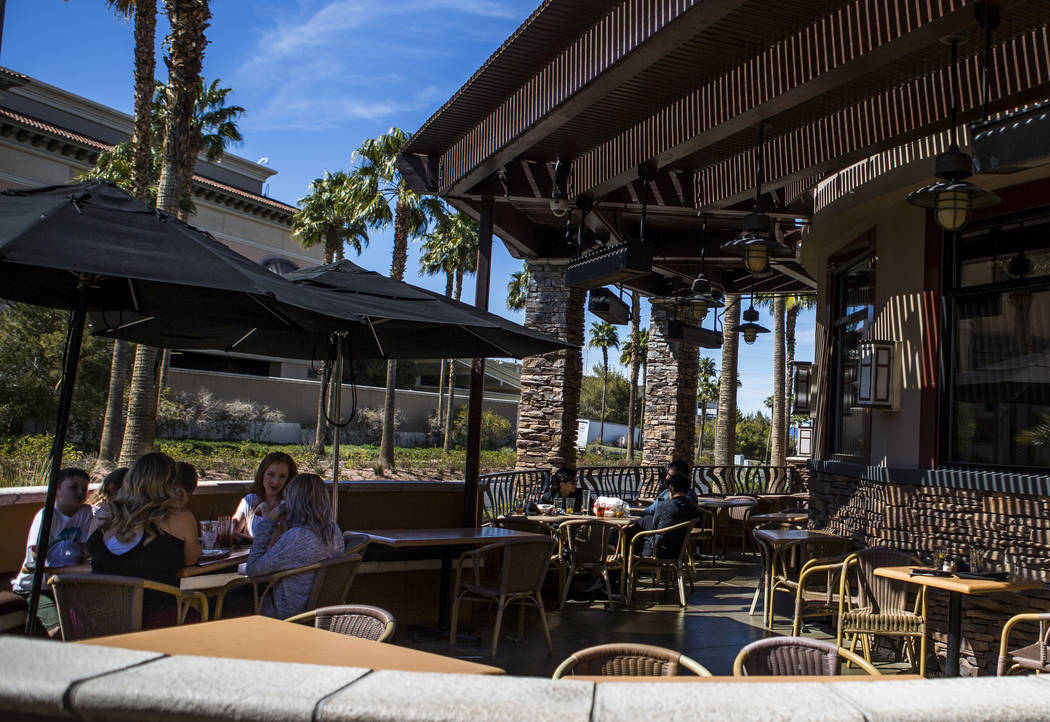 Customers dine on the patio of Elephant Bar Restaurant, located in The District at Green Valley Ranch, in Henderson on Wednesday, March 28, 2018. Las Vegas restaurateur Billy Richardson has acquir ...