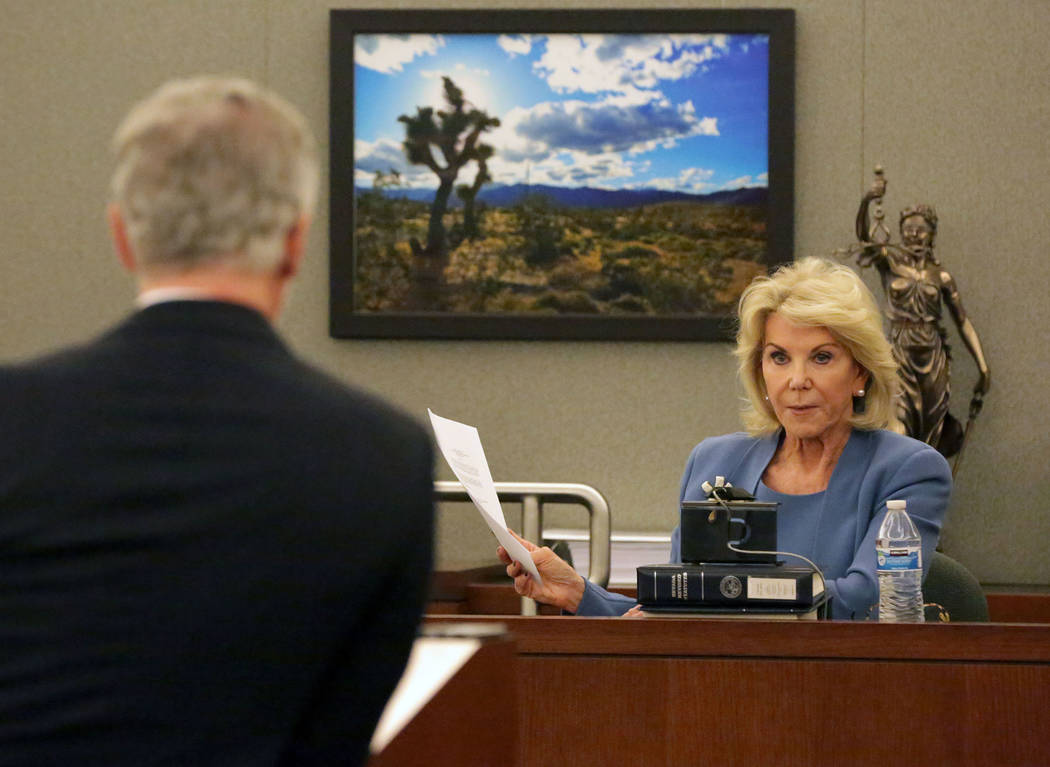 In Clark County District Court at the Regional Justice Center in Las Vegas on Wednesday, March 28, 2018, Elaine Wynn responds to questions from attorney James J. Pisanelli, left, who says Wynn is  ...