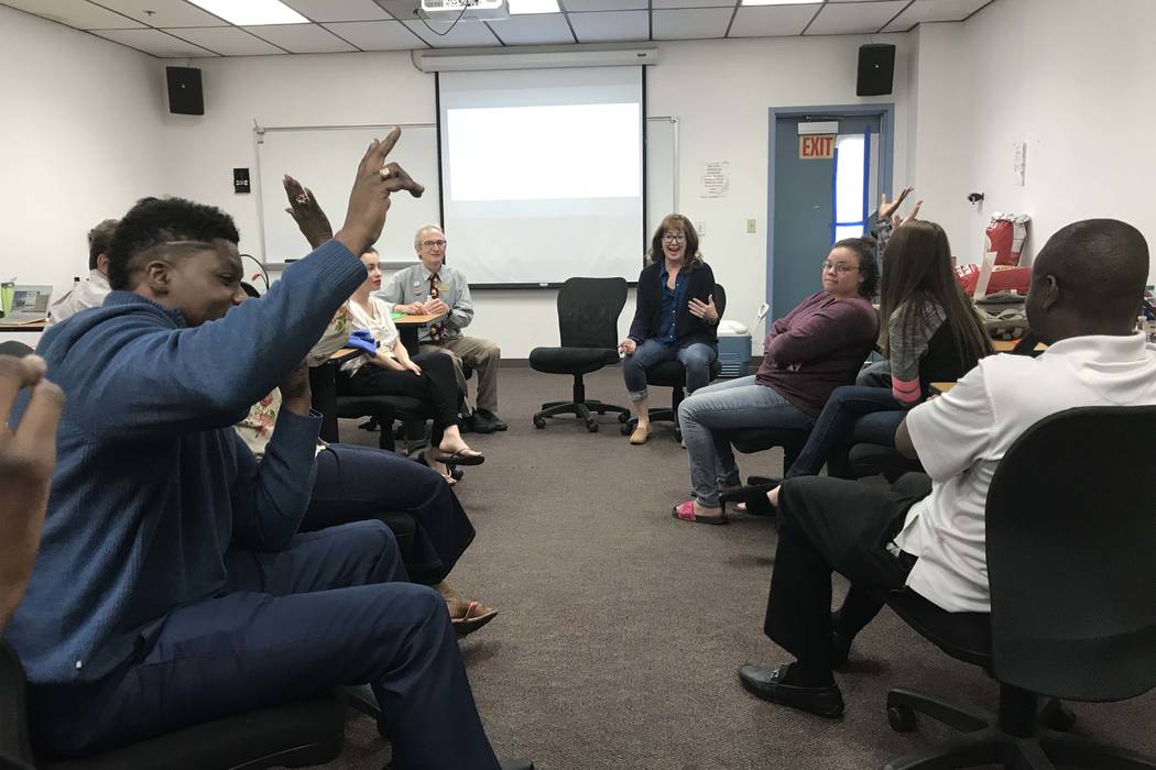 College of Southern Nevada English professor, Laura McBride, center, leads a discussion in her classroom on CSN's Henderson campus on Thursday, March 8, 2018, after a screening of the movie "Get O ...