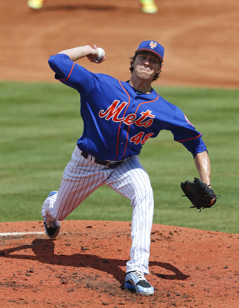 New York Mets starting pitcher Jacob deGrom (48) works in the second inning of a spring training baseball game against the Houston Astros Sunday, March 11, 2018, in Port St. Lucie, Fla. (AP Photo/ ...