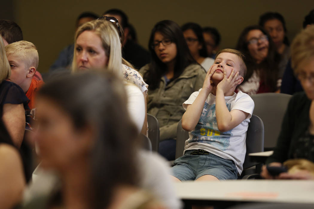 An attendee reacts to a statement during a hearing on proposed gender diverse regulations at the Department of Education's board room in Las Vegas on Friday, March 30, 2018. The State Department o ...
