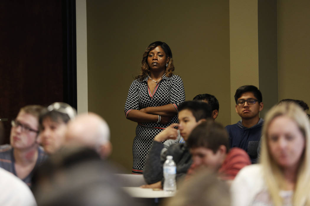 Sholanda Henry, who is married to LaDon Henry, a transgender military veteran who is running for State Assembly, attends a hearing on proposed gender diverse regulations at the Department of Educa ...