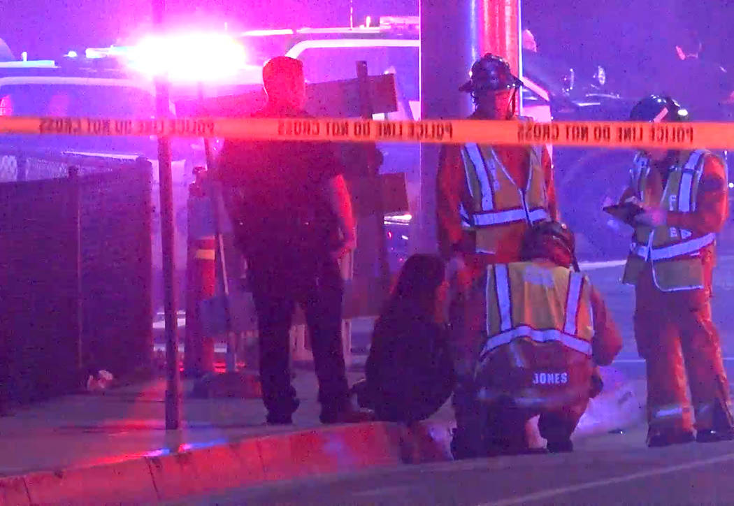 Emergency personnel respond to a car crash on the Pacific Coast Highway in Huntington Beach, Calif., Thursday, March 29, 2018. Three Centennial High School students were killed Thursday morning in ...