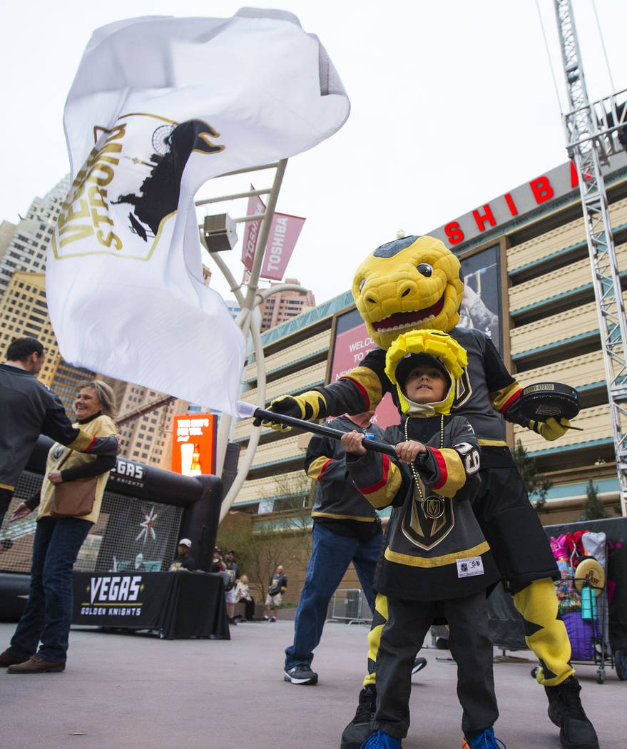 Golden Knights mascot Chance rides 'Welcome to Las Vegas' sign for