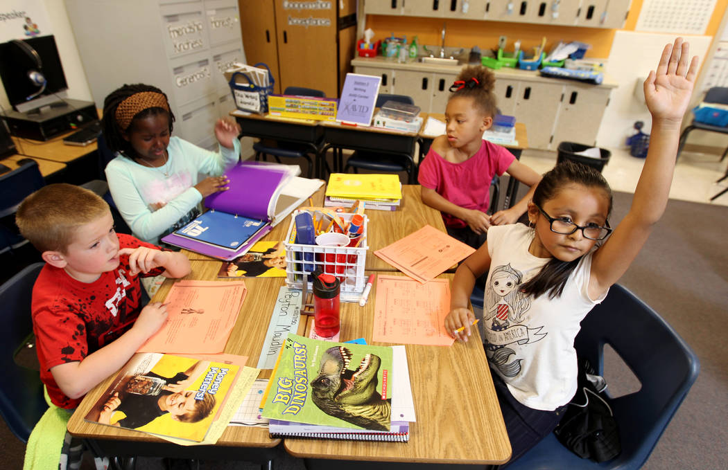 Booker Elementary School kindergarteners, from left, Peyton Maudlin, Zarina Johnson, Ya'Hynest Pope and Leah Perez-Hernandez in class, Wednesday, April 4, 2018. Booker is a Prime 6 school, part of ...