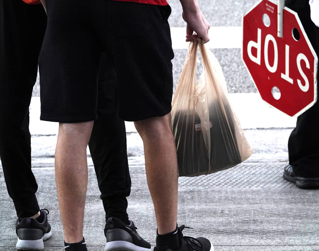 Marjory Stoneman Douglas High School students arrive back to school after spring break without backpacks, Monday, April 2, 2018, in Parkland, Fla. Students at the Florida high school where 17 peop ...