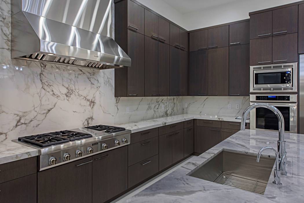 The large kitchen has upgraded appliances. (Canyon Creek Custom Homes)