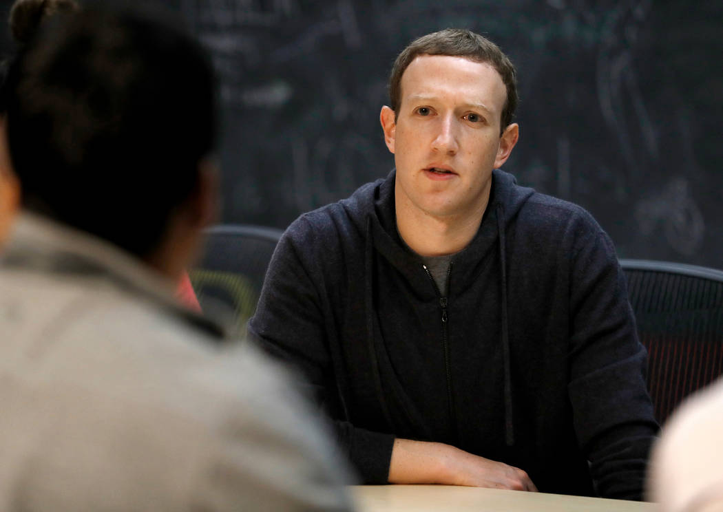Facebook CEO Mark Zuckerberg meets with a group of entrepreneurs and innovators during a round-table discussion in St. Louis, Nov. 9, 2017. As Zuckerberg prepares to testify before Congress over F ...