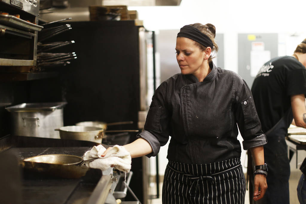 Gina Marinelli, one of two chefs hosting a pop-up dinner, prepares a meal at The Kitchen at Atomic in Las Vegas on Monday, April 9, 2018. Andrea Cornejo Las Vegas Review-Journal @dreacornejo