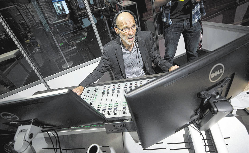 Broadcast Beat's Lead Audio Engineer Rob Dunfee works the console in the Podcast Studio during the second day of the NAB Show at the Las Vegas Convention Center on Tuesday, April 10, 2018. Richard ...