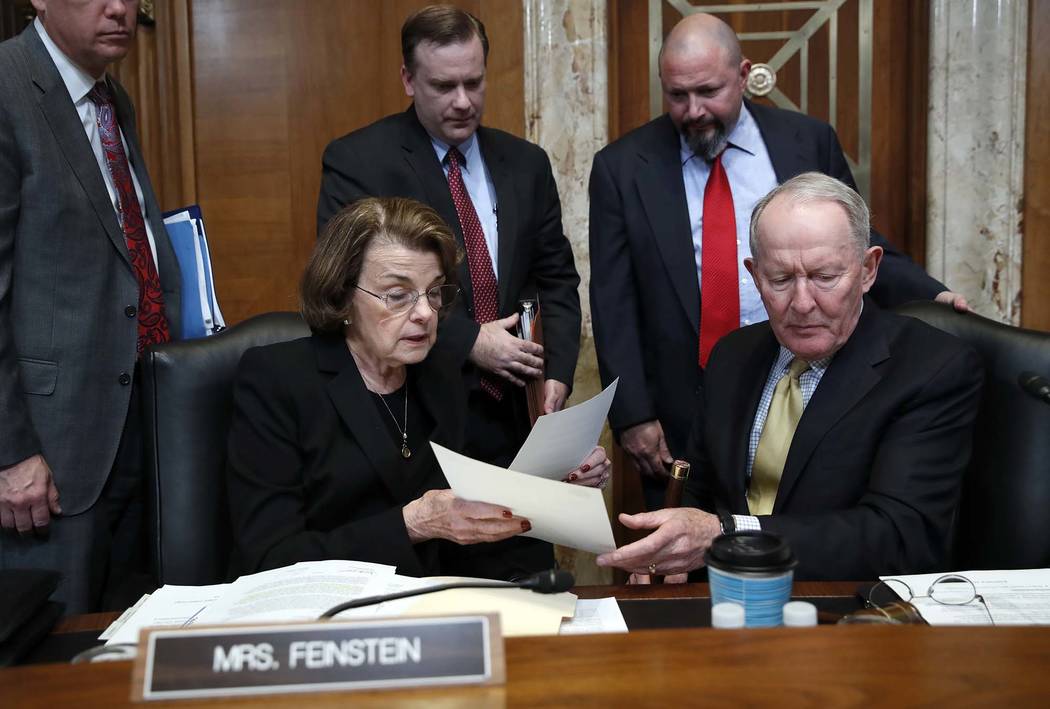 Sen. Dianne Feinstein, D-Calif., left, and Chairman Lamar Alexander, R-Tenn., talk before Energy Secretary Rick Perry testifies on the FY2019 budget during a hearing of the Senate Appropriations C ...