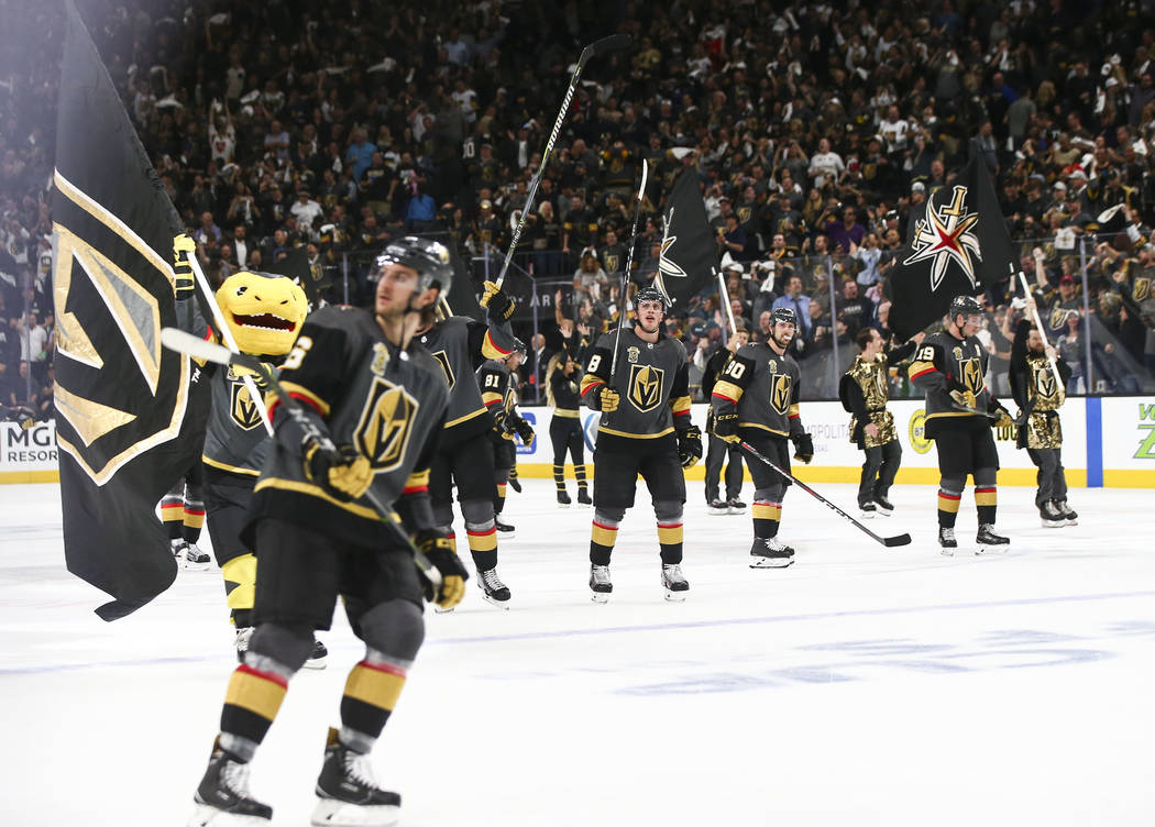 Golden Knights players celebrate their defeat over the Los Angeles Kings in Game 1 of an NHL hockey first-round playoff series at T-Mobile Arena in Las Vegas on Wednesday, April 11, 2018. Chase St ...